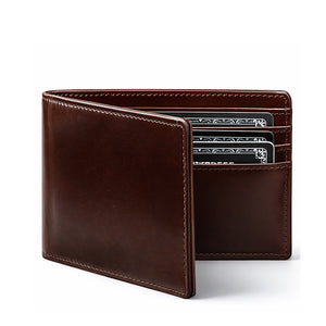 Brown leather bifold wallet partially open with card slots visible